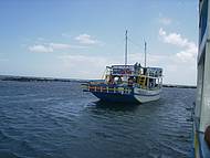 Passeio de Barco s piscinas naturais.